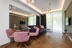 TV a/nebo společenská místnost v ubytování Baltic Amber Apartment