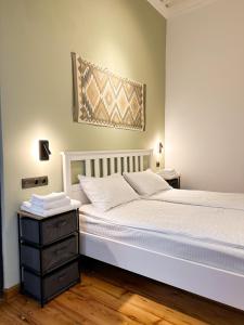 Postel nebo postele na pokoji v ubytování Tiroents Hotel