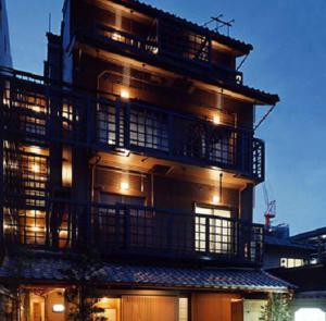 a tall building with lights on top of it at Kyonoyado Kagihei in Kyoto
