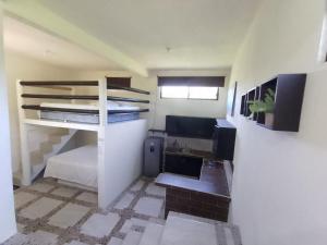 Una cama o camas en una habitación de Lazy Búngalow