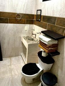 Un baño de Lazy Búngalow