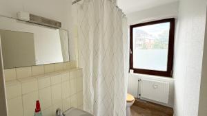 Koupelna v ubytování Apartments für Firmen & Monteure Zentral in Kiel + 38 fotografií