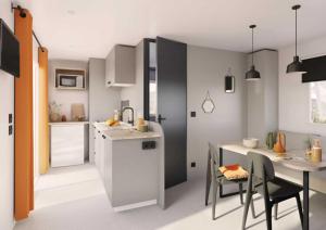 Køkken eller tekøkken på Camping 4 étoiles - Parc aquatique - ccadfdf