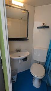 Koupelna v ubytování Chambre d'hôtel twin