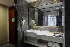 Kopalnica v nastanitvi Warm Yes Business Hotel -Free shuttle bus during the Canton Fair