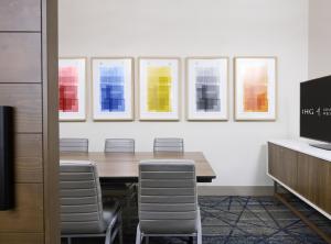 a conference room with a table and chairs at Staybridge Suites Kincardine Southeast in Kincardine