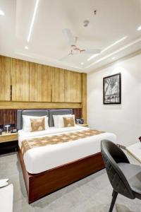 Postel nebo postele na pokoji v ubytování The Tyche New Delhi - Traveller's Choice Award Winner 2025