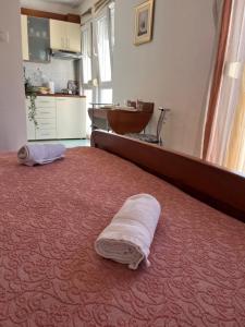 Postel nebo postele na pokoji v ubytování Apartments Znjan