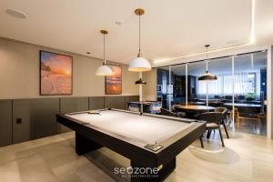Fotografie z fotogalerie ubytování Sua estadia exclusiva com piscinas e jacuzzi a 500m da praia - ELF v destinaci Bombas + 274 fotografií