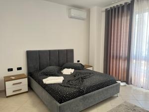 Postel nebo postele na pokoji v ubytování Orkidea Apartments