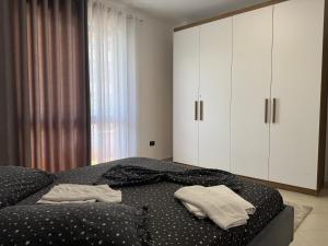 Postel nebo postele na pokoji v ubytování Orkidea Apartments