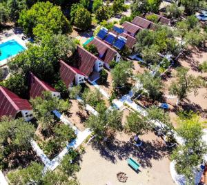 an aerial view of a resort with a pool at The Garden Tiny Homes in Ayvacık