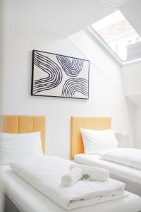 Postel nebo postele na pokoji v ubytování HOME1 - Josefstadt Apartments