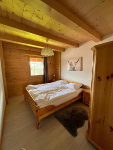 Letto o letti in una camera di Alpzyt auf Axalp