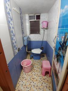 TV a/nebo společenská místnost v ubytování Ambai Guest House