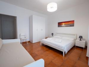 Postel nebo postele na pokoji v ubytování Torre del Salento
