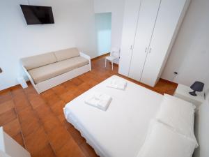 Postel nebo postele na pokoji v ubytování Torre del Salento
