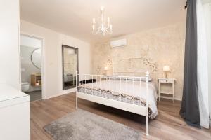 Postel nebo postele na pokoji v ubytování Accommodation TRI MURVE