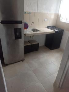Kuchyň nebo kuchyňský kout v ubytování casa particular amueblada + 8 fotografií