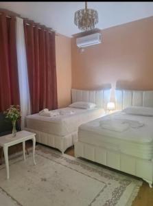 Letto o letti in una camera di Guest home Guri