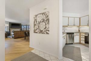 an open kitchen and living room in a apartment at Ozark Retreat at the Pointe in Branson