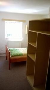 Posteľ alebo postele v izbe v ubytovaní Guest House Honzik