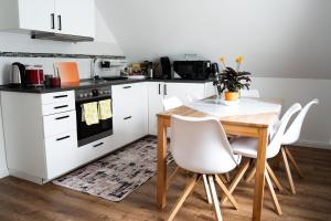 Η κουζίνα ή μικρή κουζίνα στο Ferienwohnung Horneburg +8 φωτογραφίες
