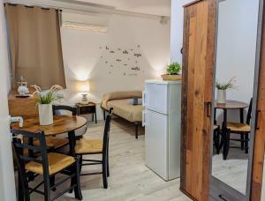 Kuchyň nebo kuchyňský kout v ubytování Castelnuovo Rooms