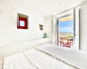 Postel nebo postele na pokoji v ubytování Mykonos Love Nest