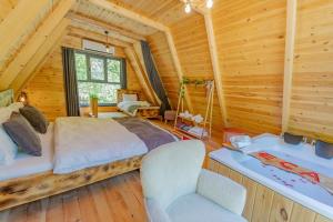 Postel nebo postele na pokoji v ubytování Eça River Bungalov