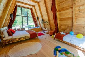 Postel nebo postele na pokoji v ubytování Eça River Bungalov