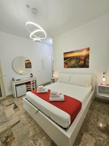 Postel nebo postele na pokoji v ubytování Albatros B&B Porto Cesareo