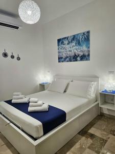 Postel nebo postele na pokoji v ubytování Albatros B&B Porto Cesareo