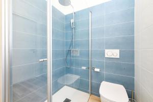 Bilik mandi di MGH- Ora del Garda Lakeview Apartment +31 gambar