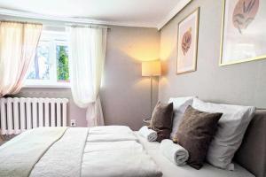 Posteľ alebo postele v izbe v ubytovaní Apartment in Ko obrzeg near Sandy Beach