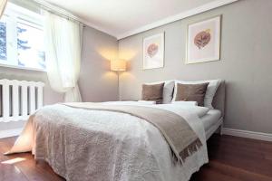 Posteľ alebo postele v izbe v ubytovaní Apartment in Ko obrzeg near Sandy Beach