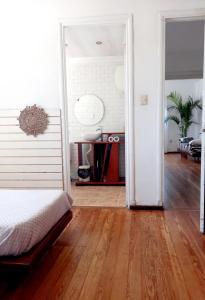 Ένα ή περισσότερα κρεβάτια σε δωμάτιο στο Apartamento Entero esquina Rambla y Centrico