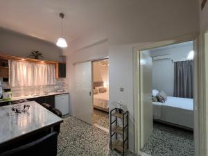 A kitchen or kitchenette at Nikos Studios