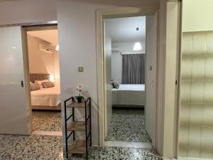 A bed or beds in a room at Nikos Studios