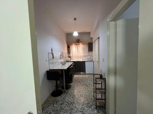A kitchen or kitchenette at Nikos Studios