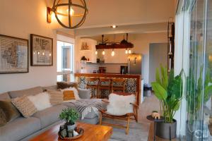 a living room with a couch and a table at Kuyayky Lodge in Lima