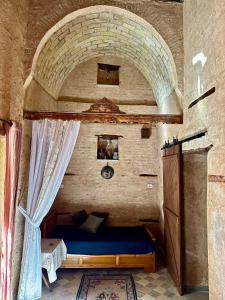 Krevet ili kreveti u jedinici u okviru objekta Suite Les Trois Arches Djamila