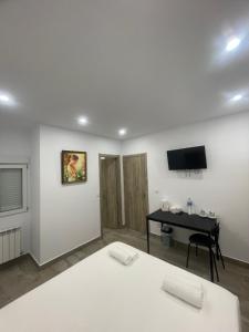 TV a/nebo společenská místnost v ubytování Habitación turística en Irún