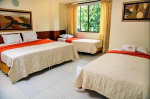 Postel nebo postele na pokoji v ubytování Hotel Monchuelo Spa