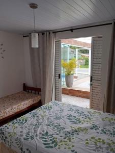 Postel nebo postele na pokoji v ubytování Casa com piscina matinhos