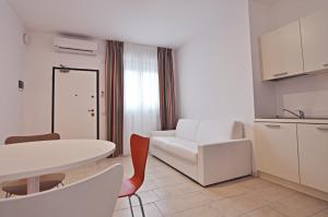 Postel nebo postele na pokoji v ubytování BB Hotels Aparthotel Visconti