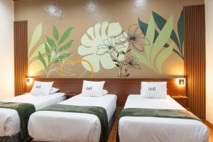 Postel nebo postele na pokoji v ubytování Bosco Hotel Boutique + 41 fotografií