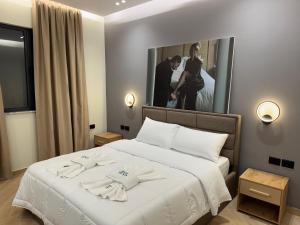 Postel nebo postele na pokoji v ubytování Hotel Tuyo