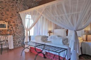 Giường trong phòng chung tại Le Mirage Resort & Spa