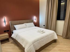 Postel nebo postele na pokoji v ubytování Hotel Tuyo
